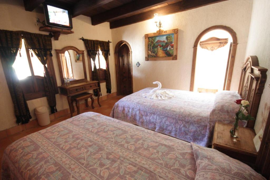 Hotel Santo Tomas Mexico Сан-Кристобаль-де-Ла-Касас Номер фото